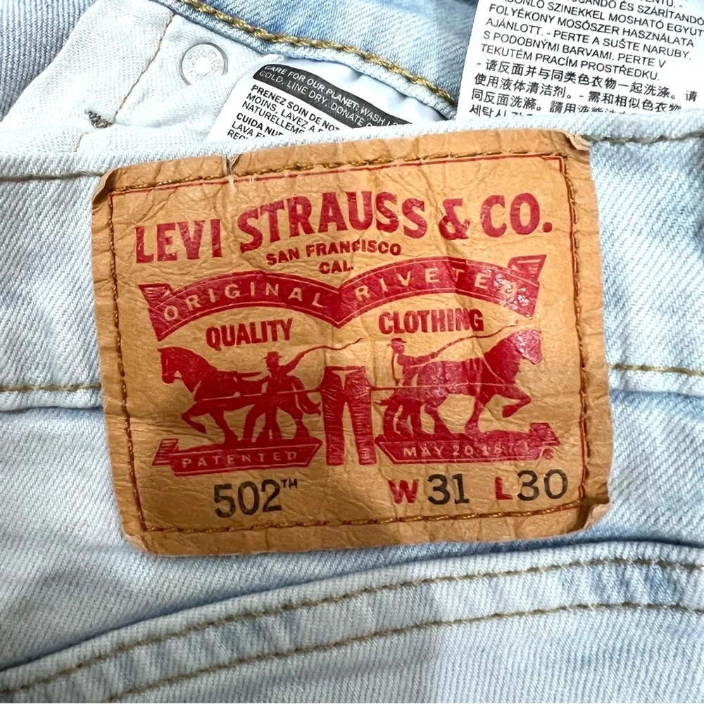 Vintage Levi’s 502 Straight Leg Taper Fit Bleach Wash Jeans 31x30